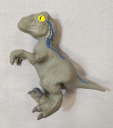 VELOCIRAPTOR BLUE ELASTICO/ESTENSIBILE JURASSIC WORLD