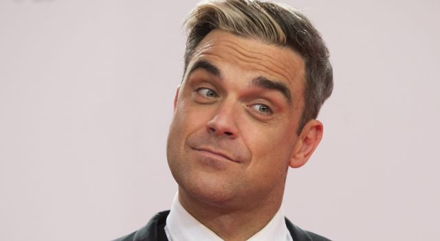 Il 13 febbraio 1974 nasce Robbie Williams